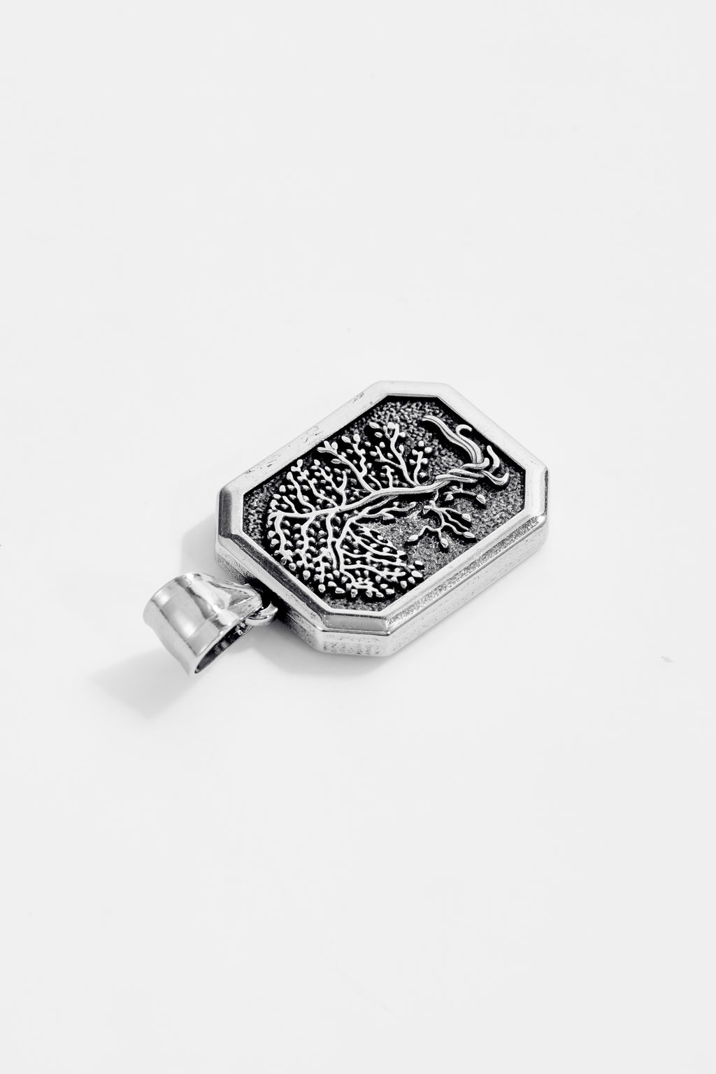 "Tree of life" pendant with octagonal border