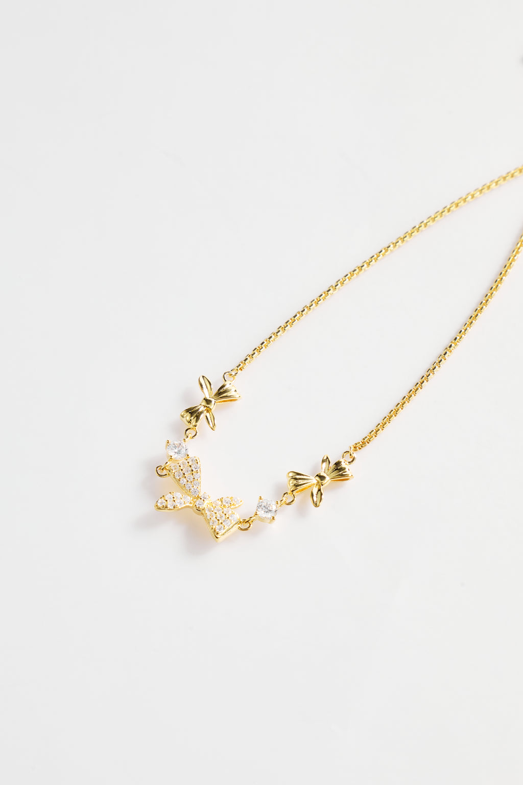 Gold-Plated Multi-Bow Design with CZ Accent Bracelet for Women