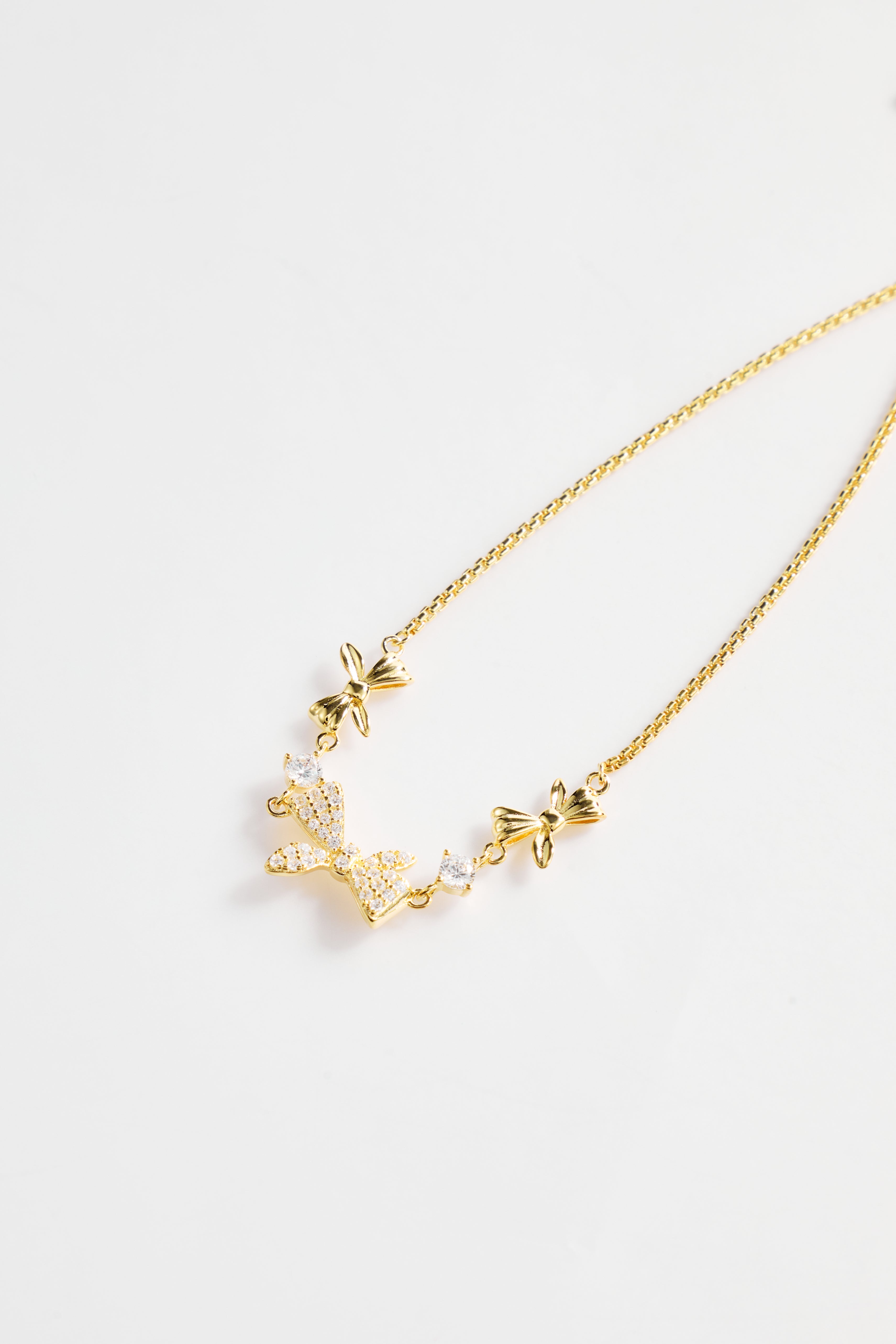 Gold-Plated Multi-Bow Design with CZ Accent Bracelet for Women