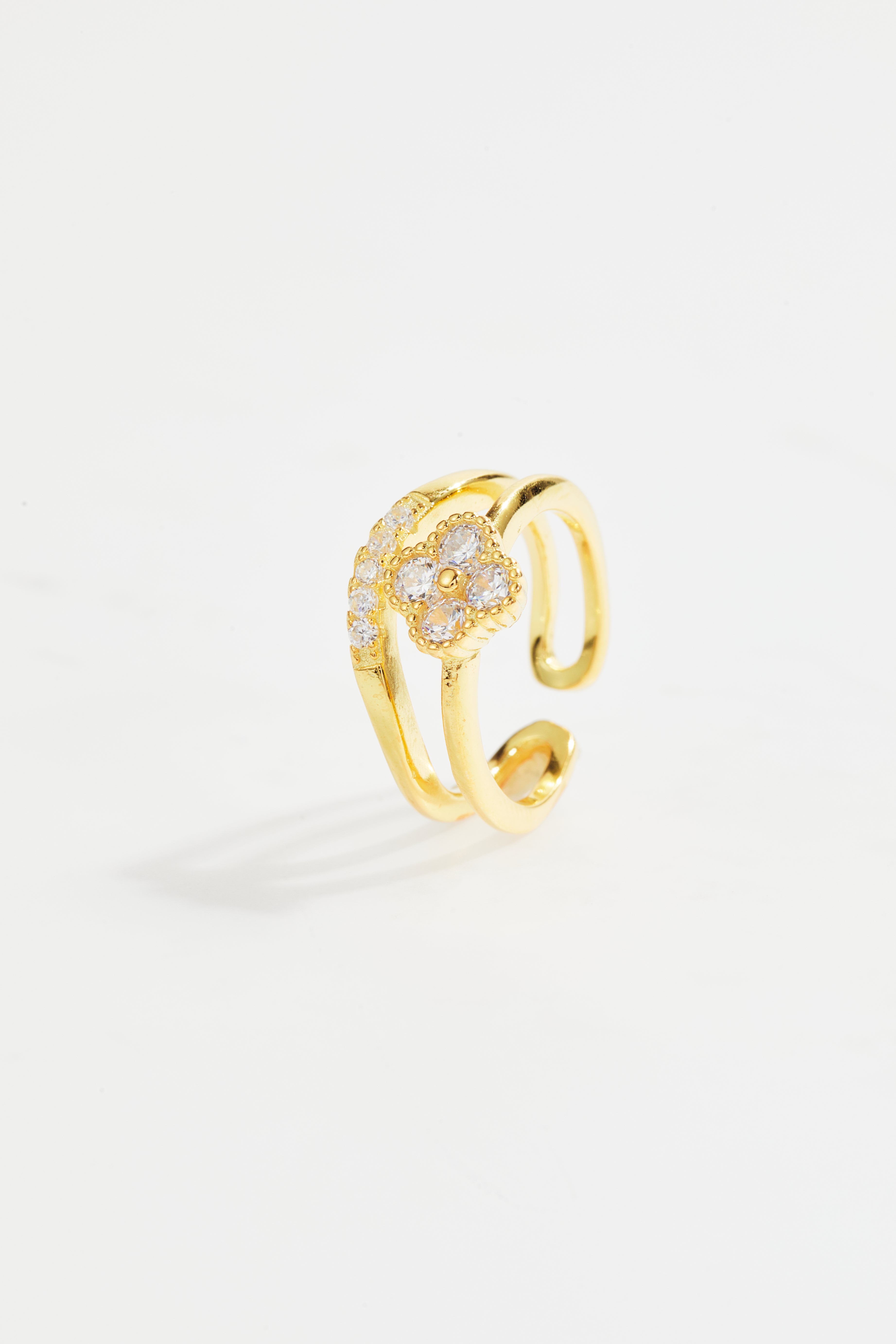 Gold-Plated double clover ring with cubic zirconia stones.