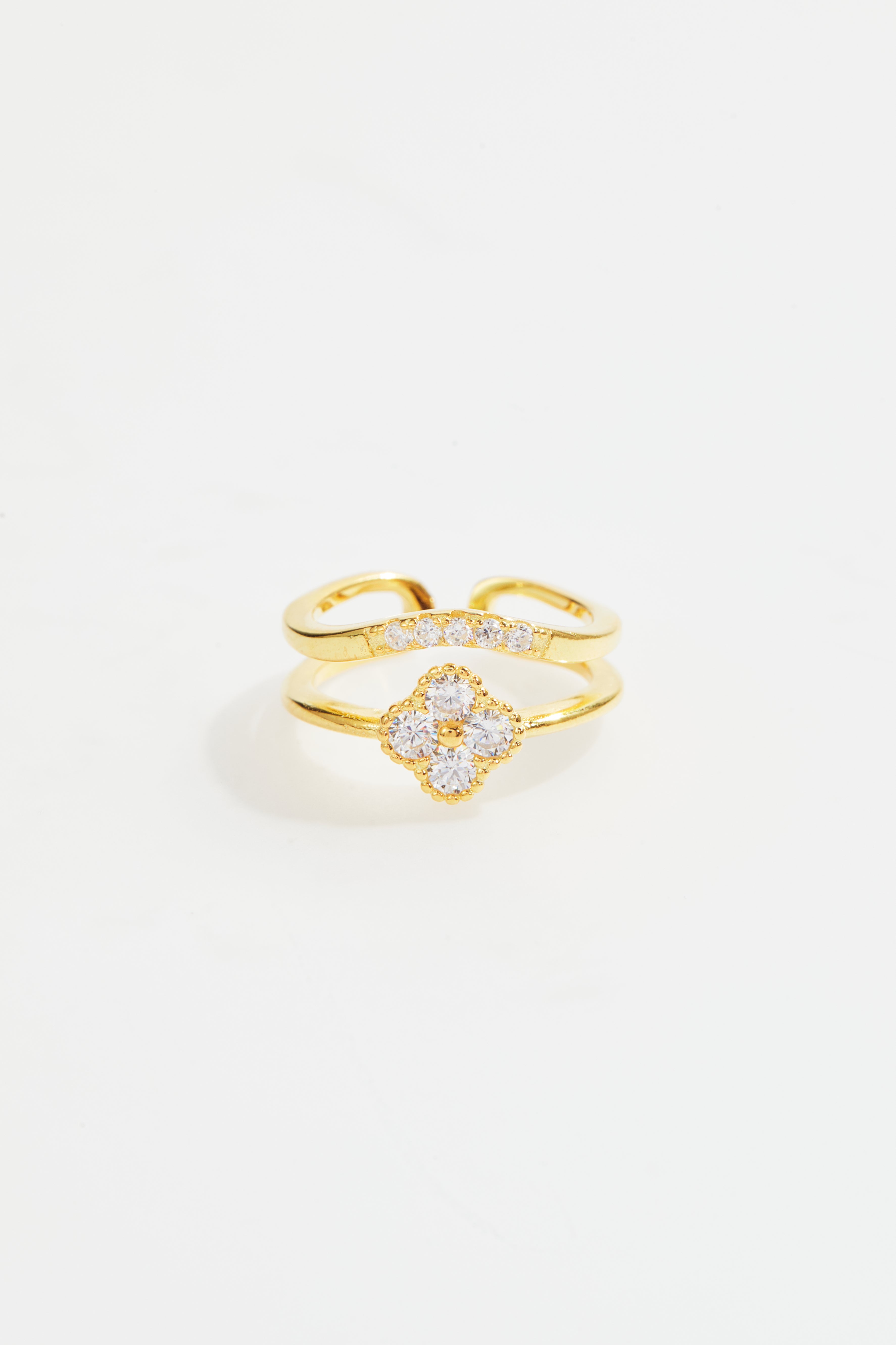 Gold-Plated double clover ring with cubic zirconia stones.